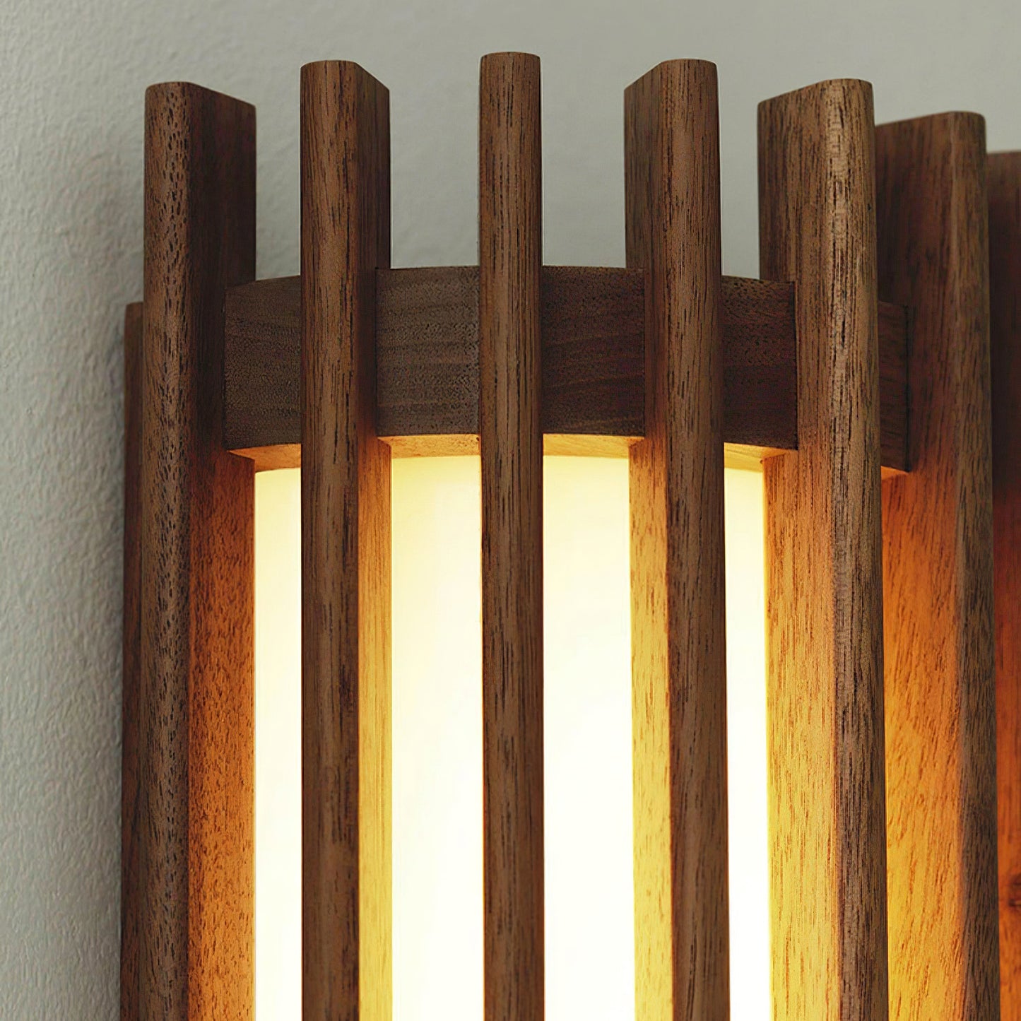 Close up of the Neyro walnut finish timber slats and the acrylic diffuser behind them