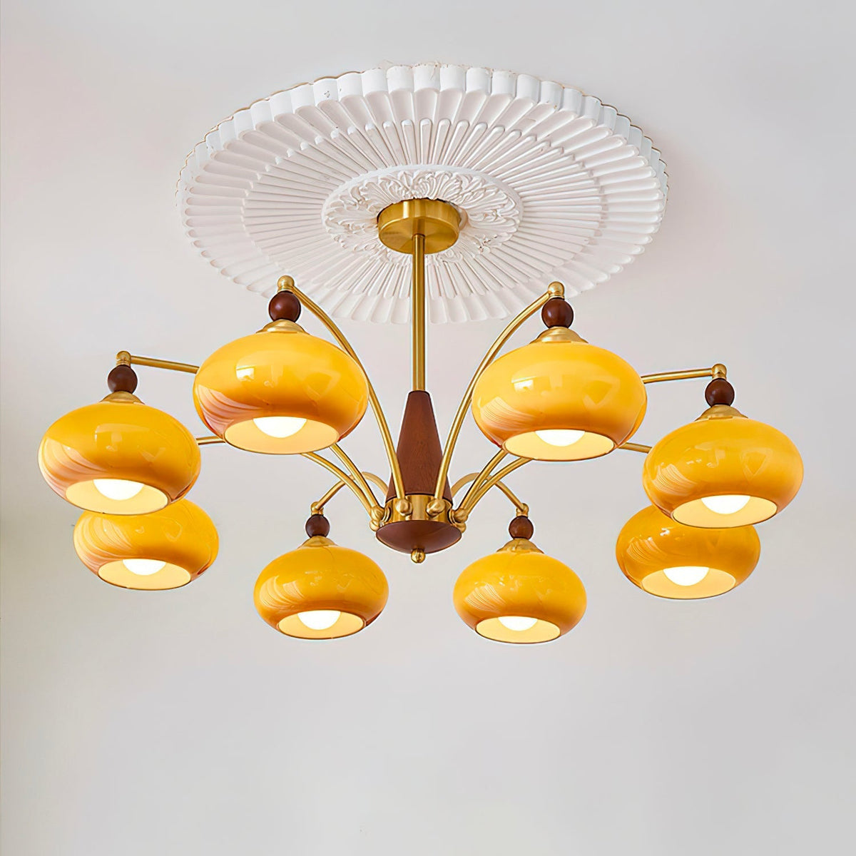 Remi 8-arm chandelier installed on decorative ceiling rose