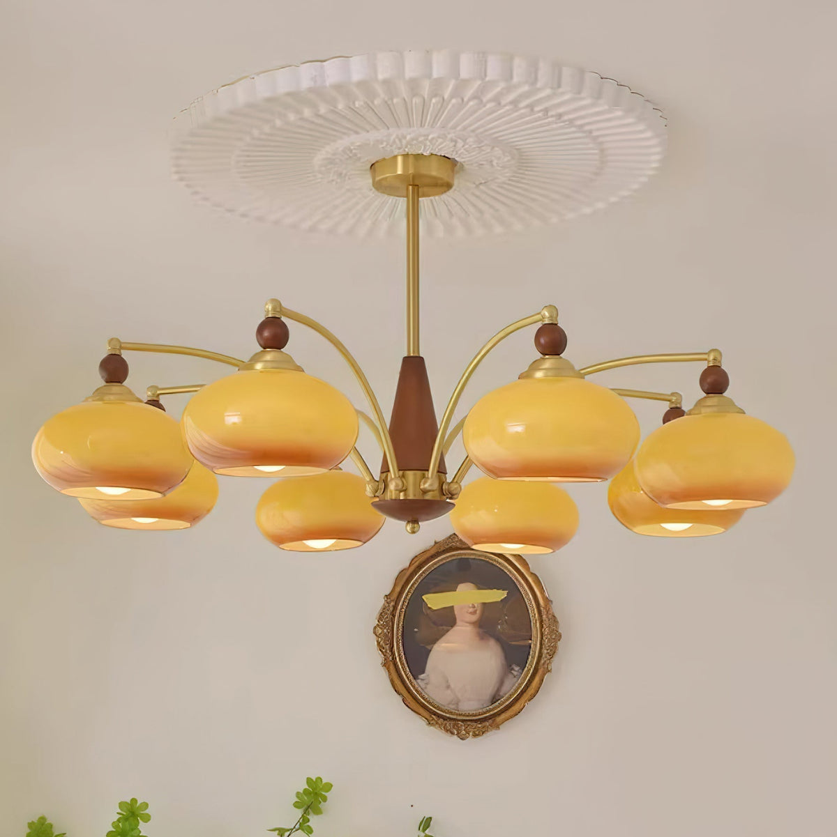 Remi 8-arm chandelier in room setting warm amber light