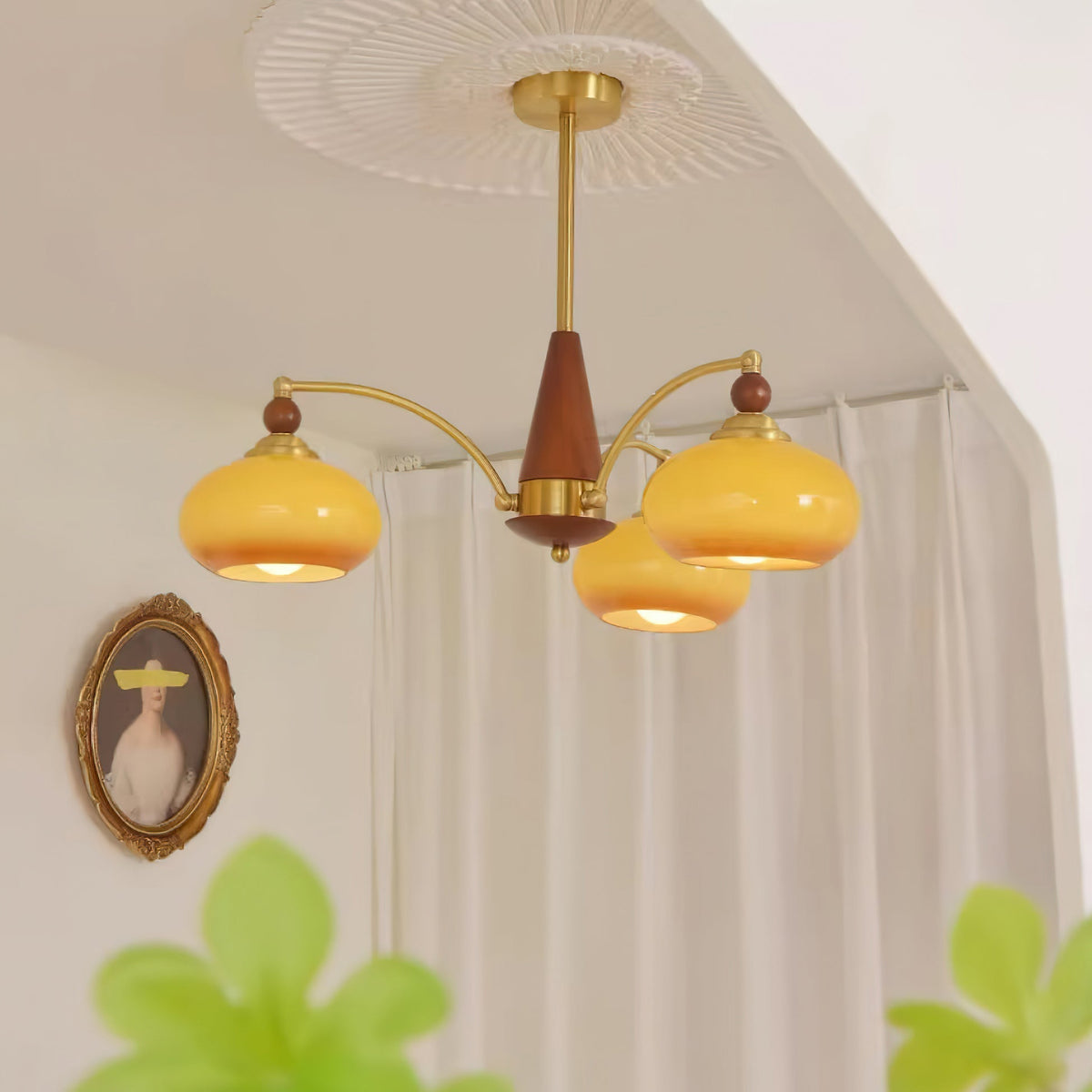 Remi 3-arm chandelier with curtain backdrop warm amber