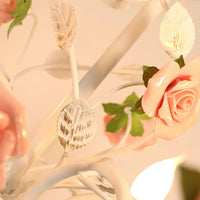Rosven chandelier ceramic rose and iron leaf detail close-up