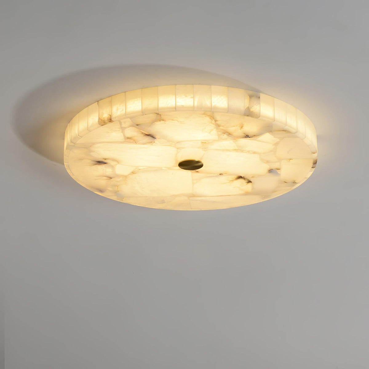 Cirra alabaster flush ceiling light overhead view with warm glow
