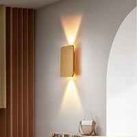 Koda wall light lit on wall