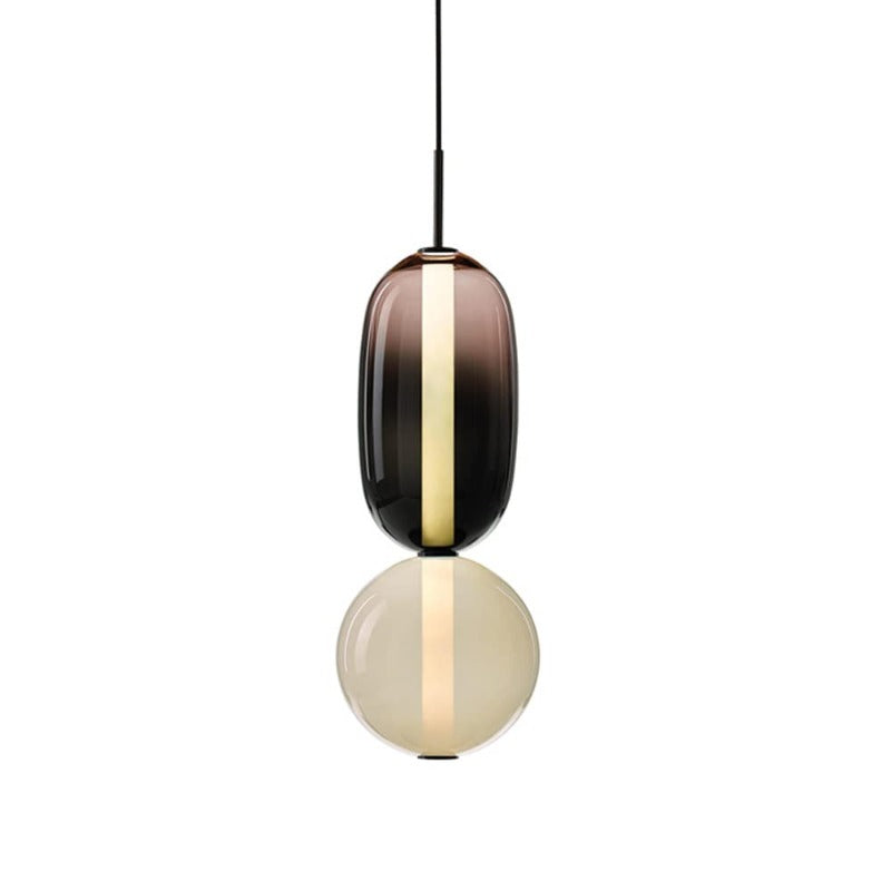 Ambero pendant light shown lit against a plain background, showing the vertical LED strip between the two glass shades