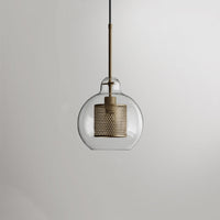 Lockhone Hesso globe pendant light in gold with a clear glass shade on a plain background