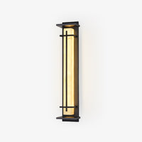 Rayo Alabaster Outdoor Wall Light with black steel frame and glowing alabaster shade on white background