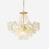 Delvi three tier pressed glass and pearl bead chandelier with gold tone frame on a plain white background