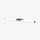 Morva linear wall light, a slim white acrylic tube with a gold centre bracket and end caps, on a plain white background
