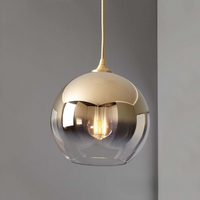 Orba single gold gradient glass globe pendant close-up