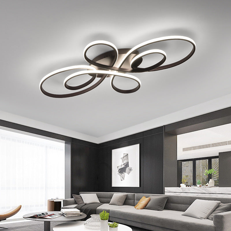 Kelo Multi-Ring LED ceiling light installed in modern dark living room