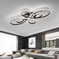 Kelo Multi-Ring LED ceiling light installed in modern dark living room