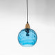 Riplo blue ripple glass pendant light with brass lamp holder and black cord on a plain white background