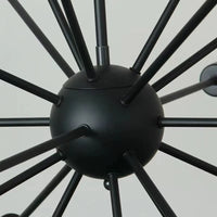 Close up of the matt black centre sphere and arm joints of the Kytto sputnik chandelier