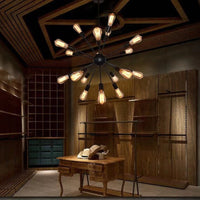 Kytto sputnik chandelier lit in a wood panelled room above a wooden table