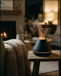 Volcano flame diffuser glowing on a side table in a cosy evening living room