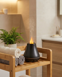 Volcano flame diffuser on a bathroom spa shelf