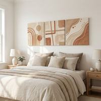 Form geometric canvas triptych above a bed