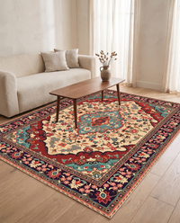 Sora Bohemian Velvet Rug in a warm-neutral living room beneath a walnut coffee table beside a cream boucle sofa