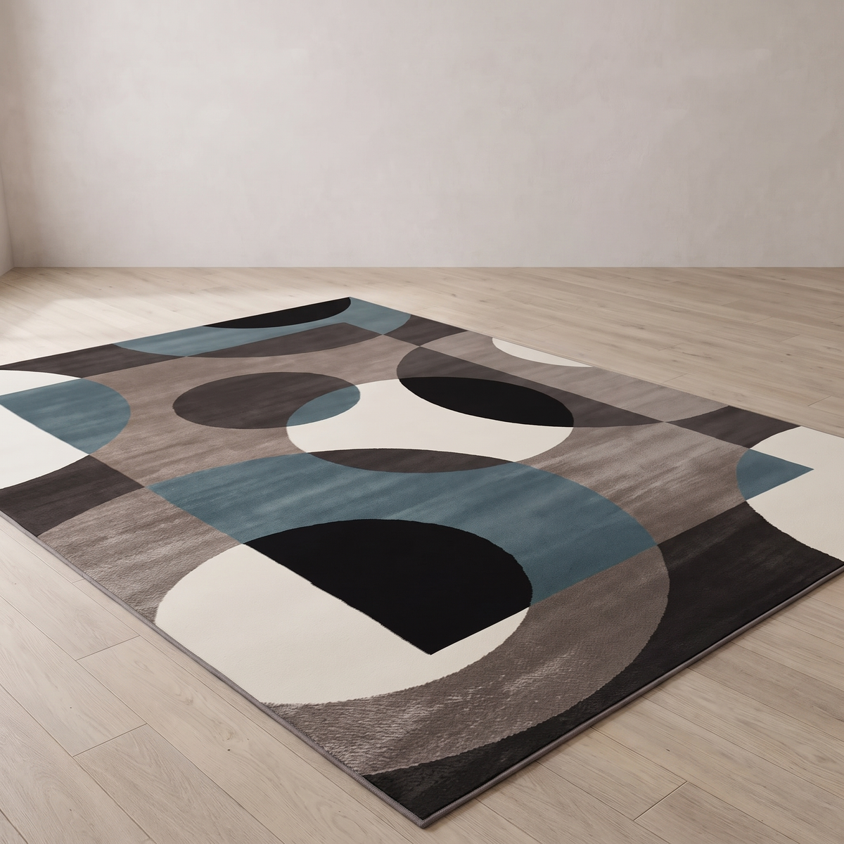 Lindo petrol geometric flannel rug laid flat on a pale oak floor against a plaster wall, showing the full 120 x 160 cm rectangle