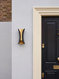 Corva Curved Outdoor Wall Light - scale reference beside classic British front door showing compact 15cm fixture