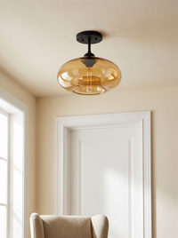 Valto Globe Ceiling Light - scale view with doorframe and armchair for size reference