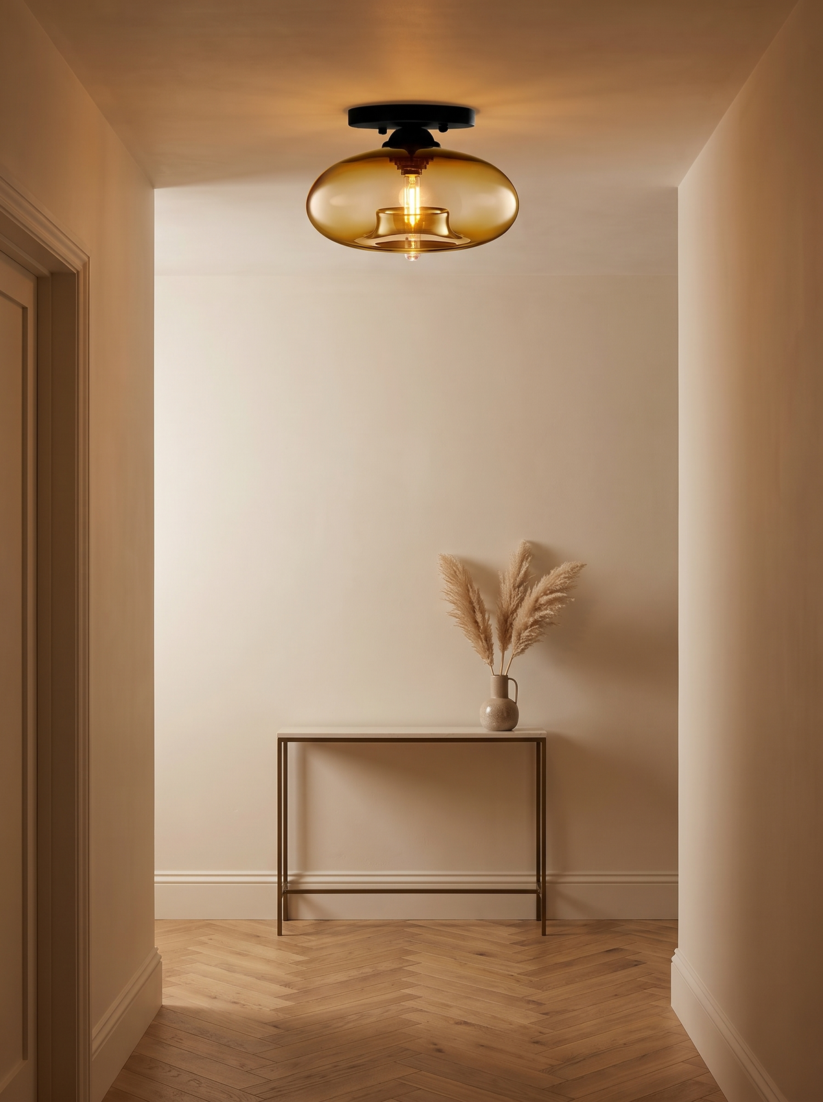 Valto Globe Ceiling Light - amber glass lifestyle in cream hallway with oak herringbone floor