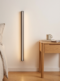Granto Linear Wall Light - scale shot beside bedroom table showing 60cm length
