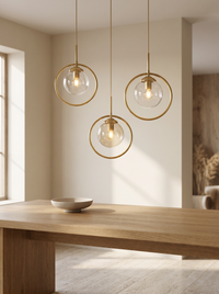 Orbia Ringed Glass Pendant Light - three pendants at scale over oak dining table, cream interior