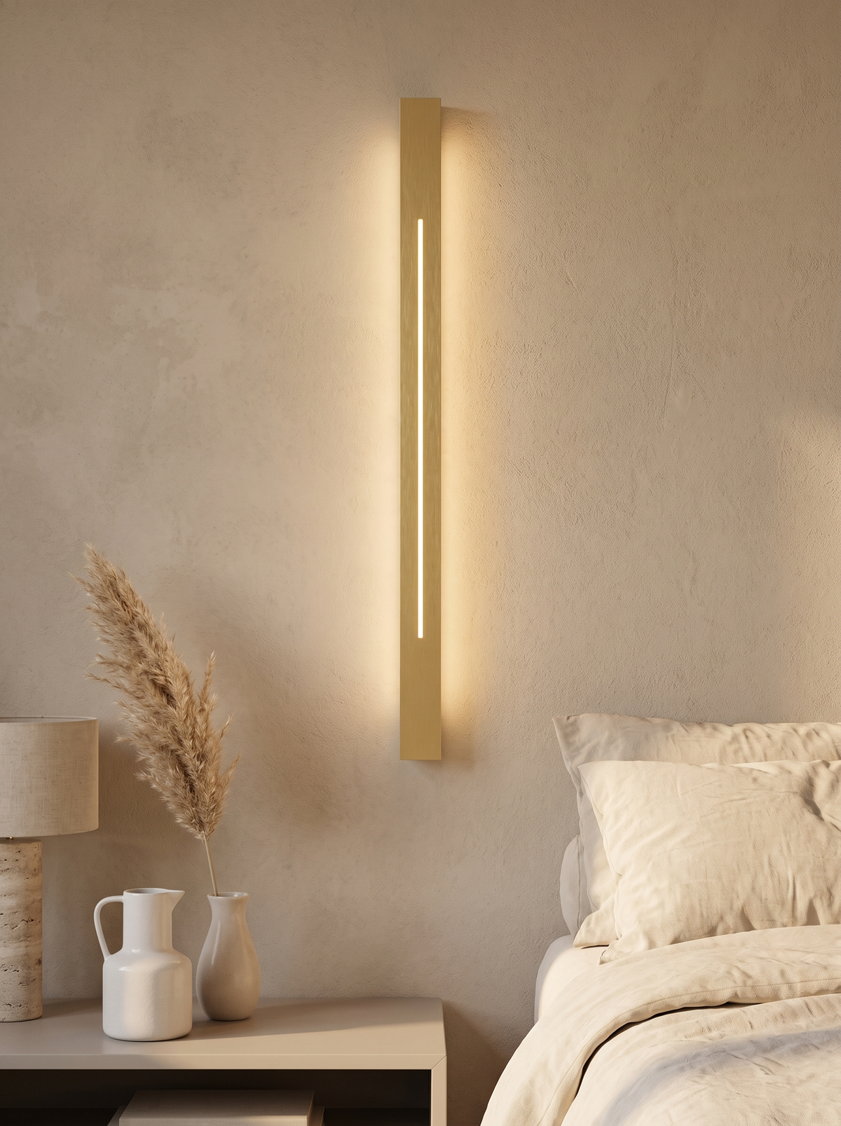 Azino Slim LED Wall Light - styled lifestyle bedroom scene with oat walls, warm evening glow, pampas grass and ceramic bedside styling