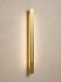 Azino Slim LED Wall Light - angled three-quarter view on cream plaster wall showing depth and warm 2700K glow