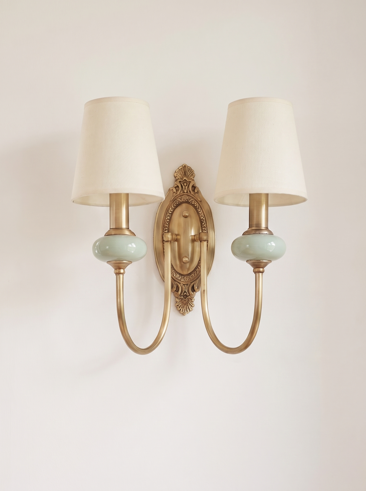Orla Twin Fabric Shade Wall Light - clean editorial on plain warm white wall
