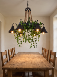 Corven Six-Arm Ceiling Light - scale reference above reclaimed oak dining table, warm Edison glow, cream plaster room
