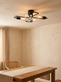 Indro Industrial Multi-Arm Ceiling Light - lifestyle scale shot above oak dining table in warm cream UK interior