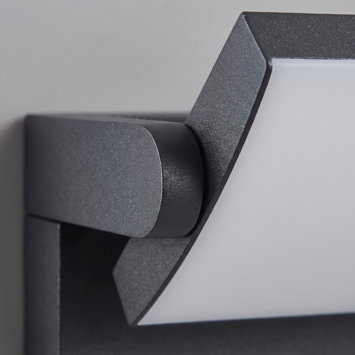 Shiro Swivel Outdoor Wall Light - macro close-up of anthracite texture and swivel hinge detail