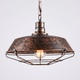 Vorden Industrial Cage Pendant Light in rustic copper-rust finish, plain background