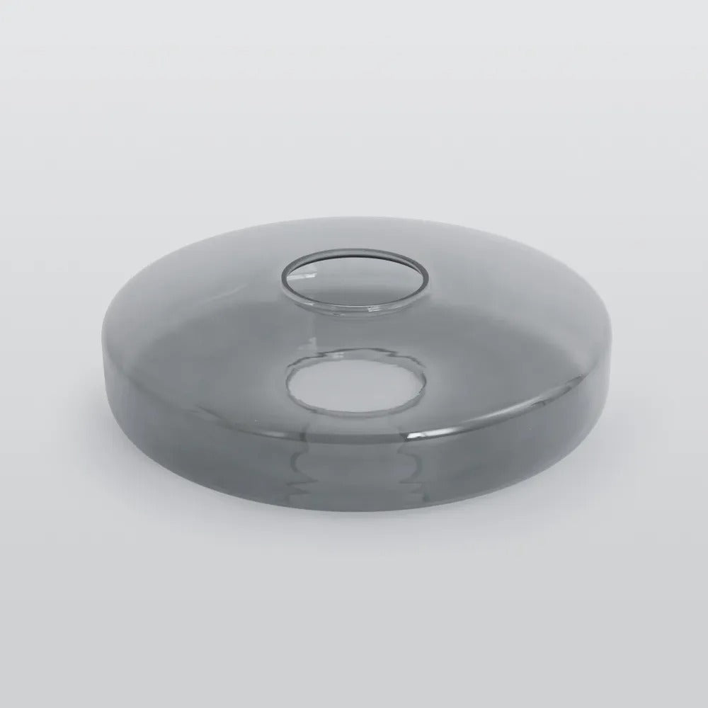 Close detail of the smoke grey glass disc used on the Jovo pendant light