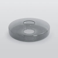 Close detail of the smoke grey glass disc used on the Jovo pendant light