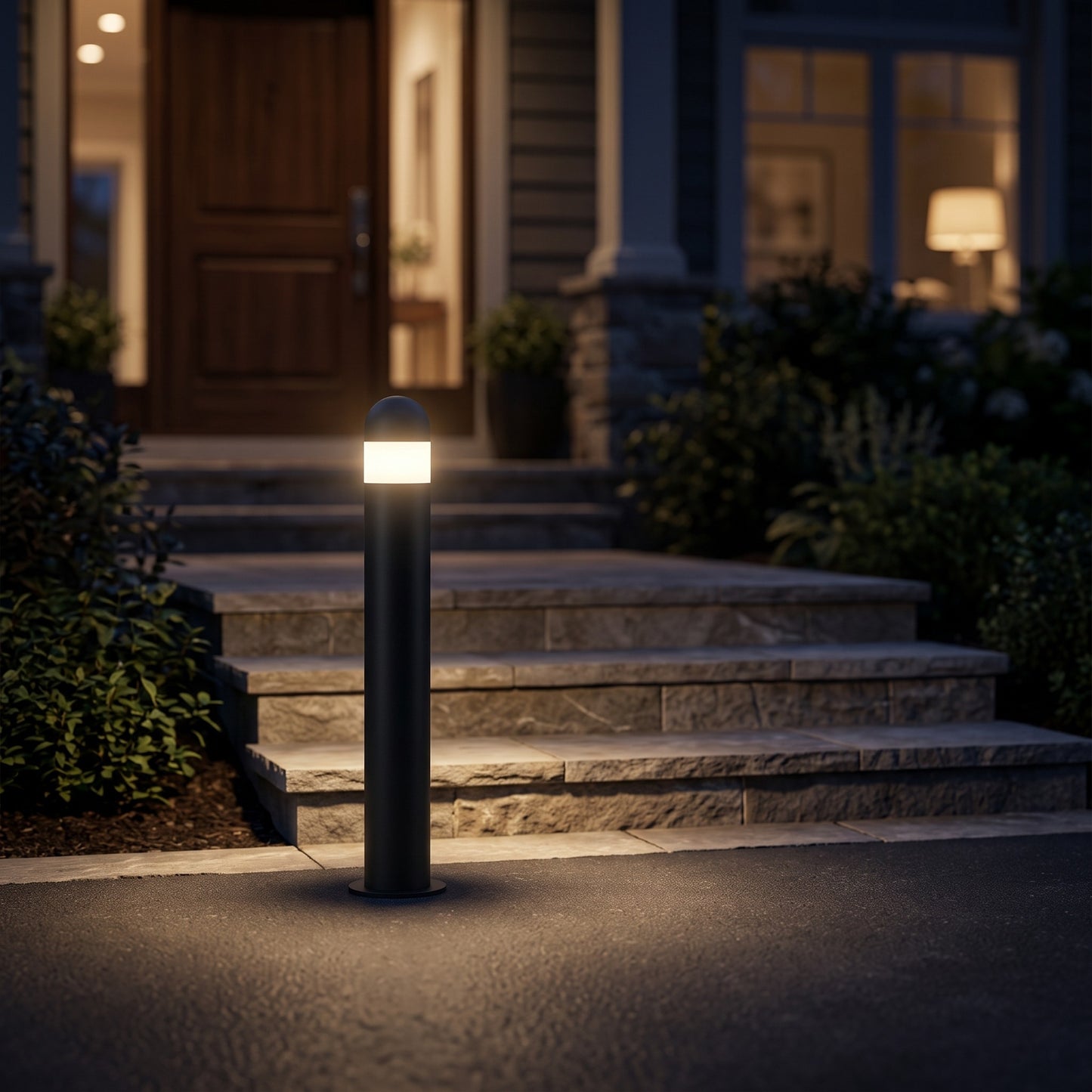 Lena pedestal light beside stone steps at night