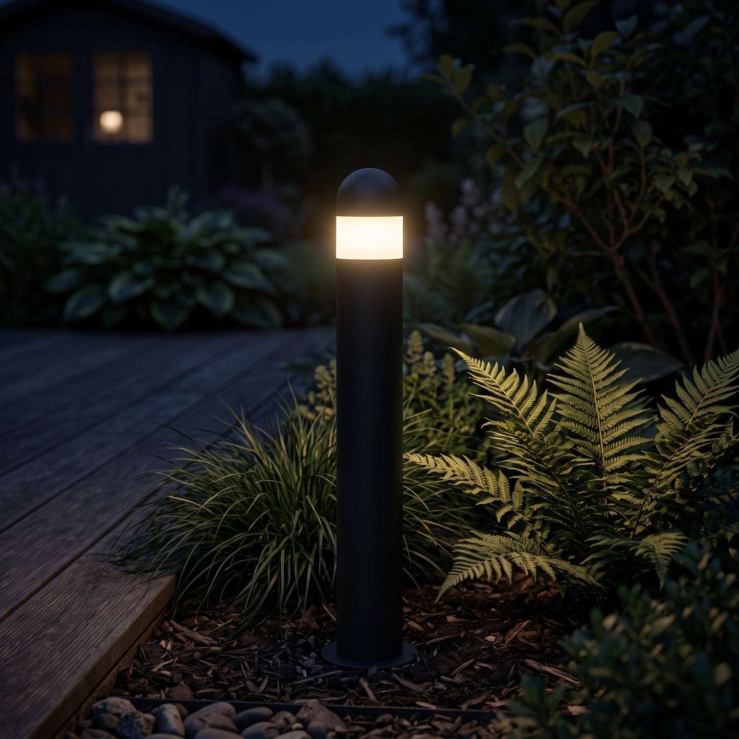Lena pedestal light in a garden border