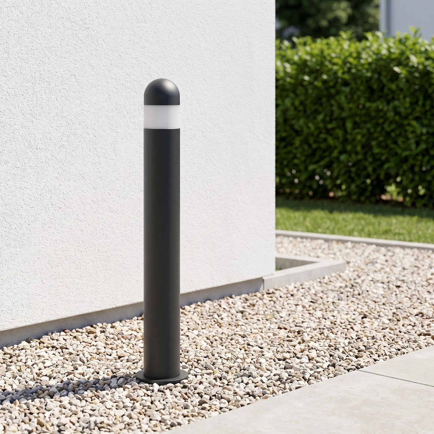 Lena pedestal light on a gravel path in daylight