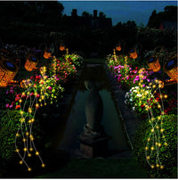 Cascading Solar Watering Can Light