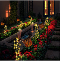 Cascading Solar Watering Can Light