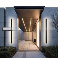 Sela linear wall lights at a modern entrance