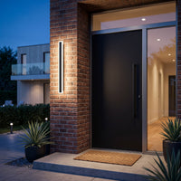 Vina wall lights on a facade at twilight