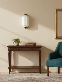 Faro Flush Milk Glass Wall Light in a hallway above a dark wood console table