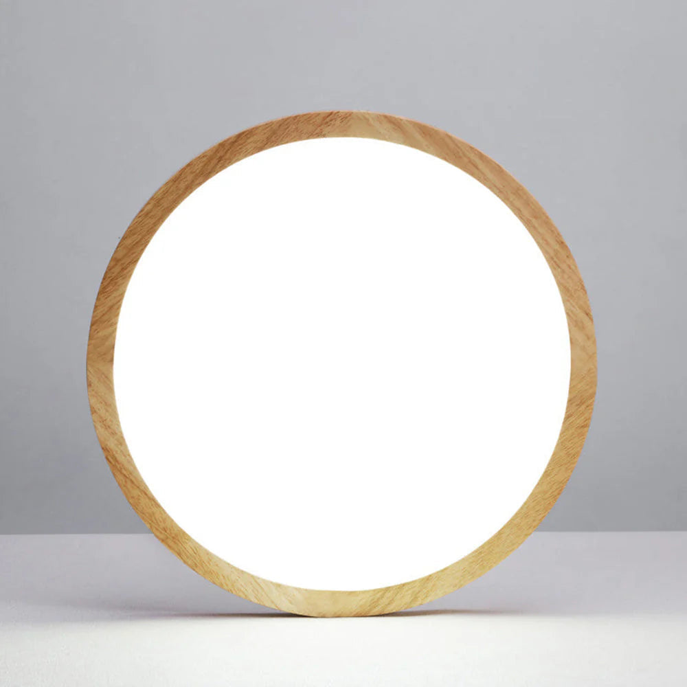 Aveno ceiling light stood on edge showing the slim 3cm wood rim profile