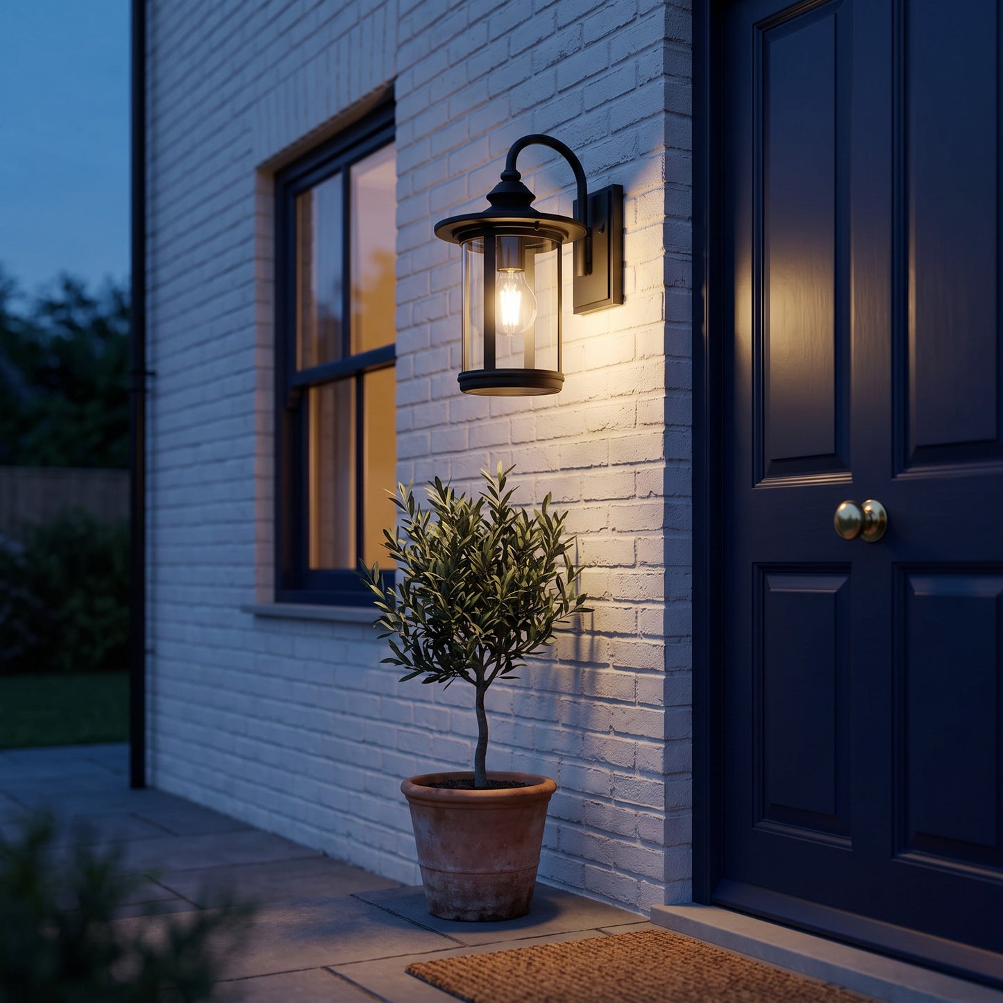 Zaya lantern on a brick porch wall
