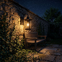 Zaya lantern on a garden wall at night